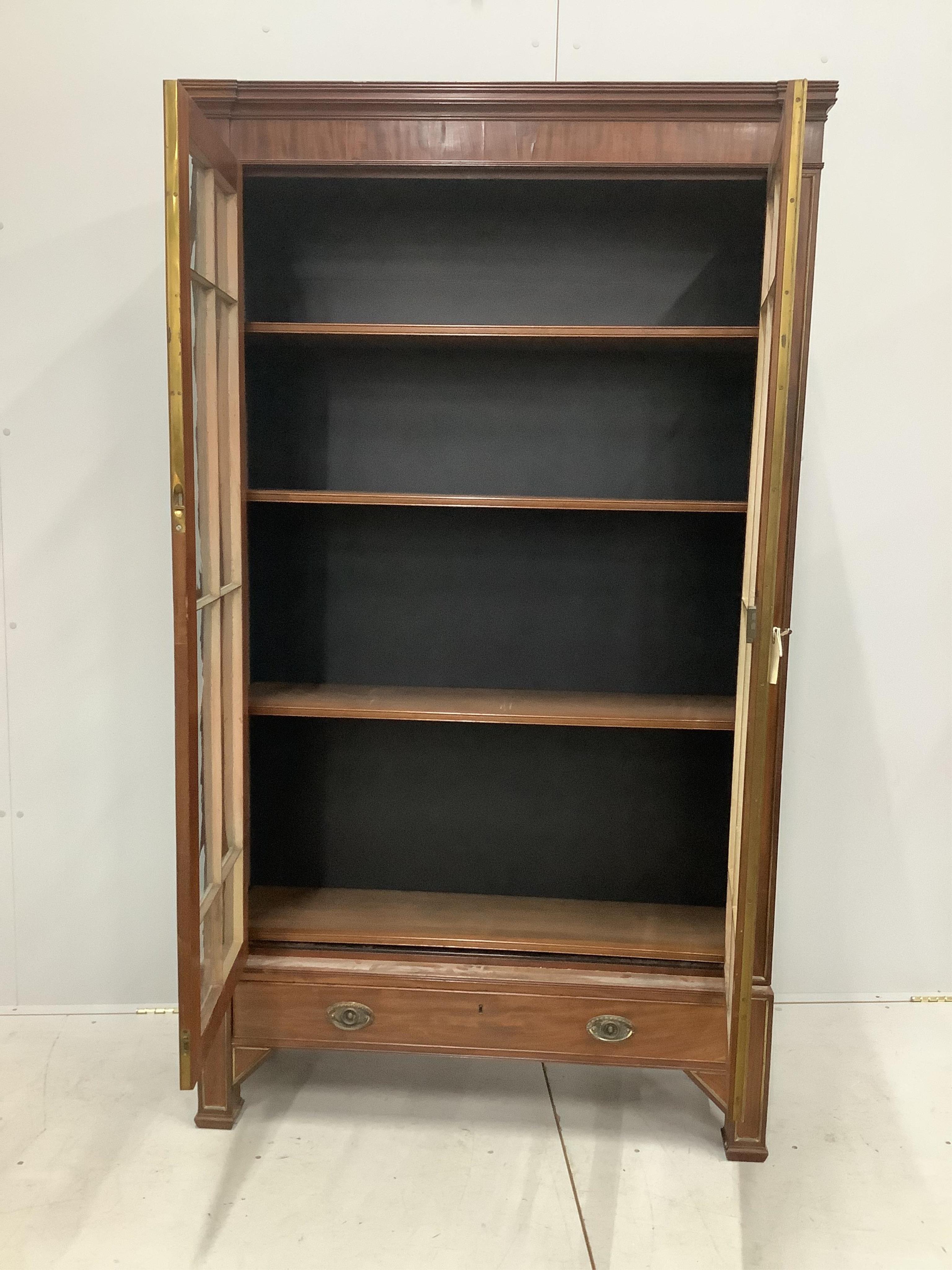 A 19th century French brass mounted mahogany bookcase, width 112cm, depth 32cm, height 195cm. Condition - fair